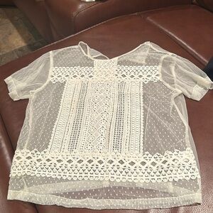 Ivory lace/embroidered top.